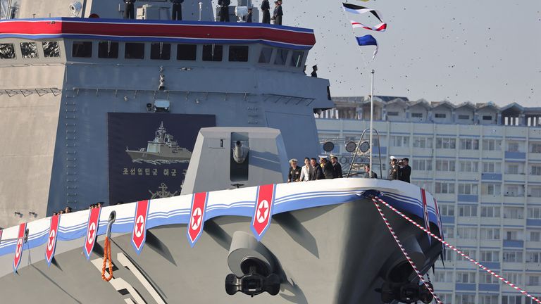 Kim Jong Un and his daughter Kim Ju Ae at the launch of another destroyer last month. Pic: Reuters