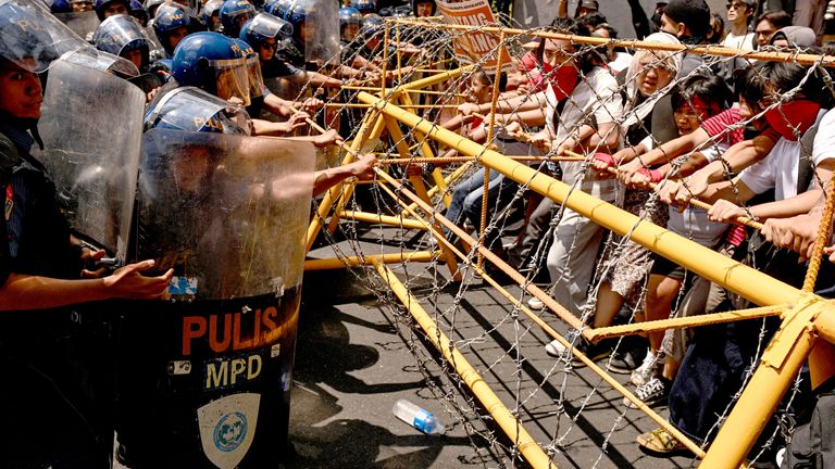 Protesters clash with the police during a Labour Day demonstration in Manila, Philippines.  Pic: Reuters