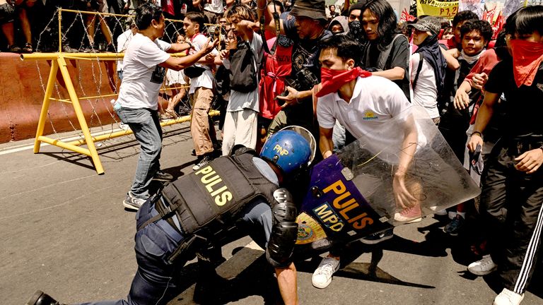 Protesters clash with the police during a Labour Day demonstration in Manila, Philippines.  Pic: Reuters