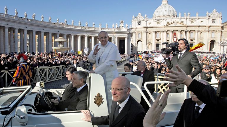 Pope Francis waves as he arrives in Saint Peter's Square for his inaugural mass at the Vatican, March 19, 2013. Pope Francis celebrates his inaugural mass on Tuesday among political and religious leaders from around the world and amid a wave of hope for a renewal of the scandal-plagued Roman Catholic Church. REUTERS/Remo Casilli