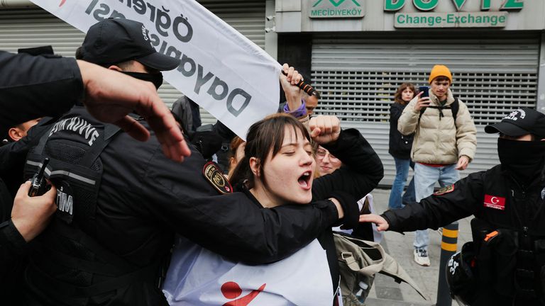 Protesters scuffle with riot police as they attempt to defy a ban and march on Taksim Square to celebrate May Day in Istanbul, Turkey.  Pic: Reuters