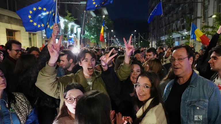 Supporters of Mr Dan celebrated on the streets of the capital Bucharest. Pic: AP