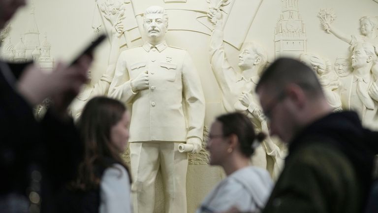 "The Gratitude of the People to Leader-Commander" portraying Soviet leader Joseph Stalin at the Taganskaya subway station in Moscow.  Pic: AP/Pavel Bednyakov