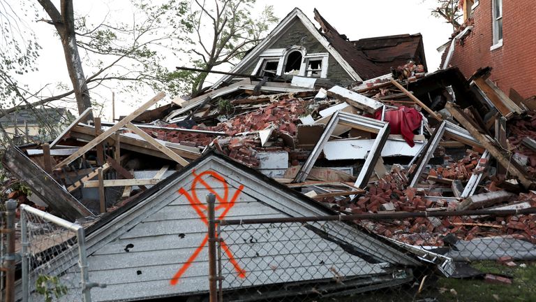 A house completely collapsed in St Louis, Missouri on Friday. Pic: Reuters