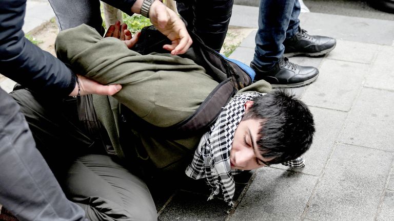 Police detain a demonstrator, as people attempt to defy a ban and march on Taksim Square to celebrate May Day in Istanbul, Turkey May 1, 2025. REUTERS/Umit Bektas