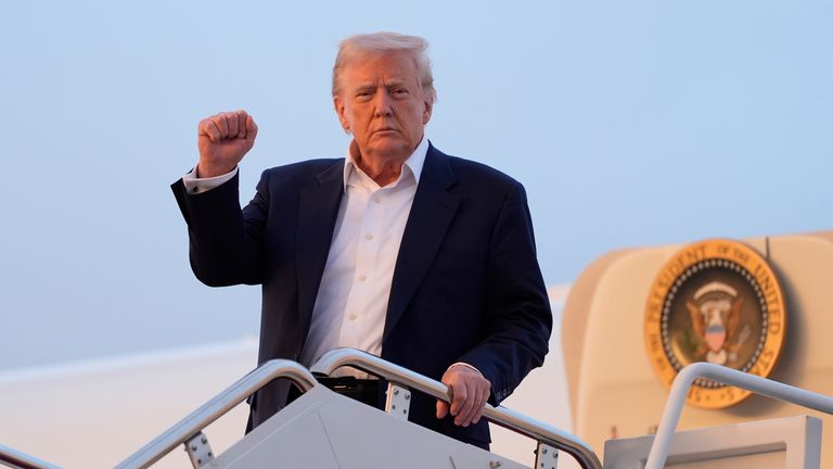 President Donald Trump on Air Force One earlier this month. File pic: AP