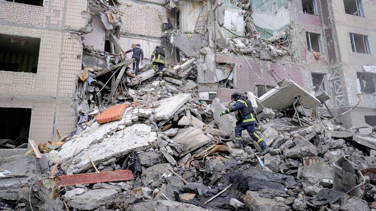 Rescuers work at the site of an apartment building  damaged by a Russian air strike in the frontline town of Kostiantynivka.   Pic: Ukrainian Armed Forces/Reuters