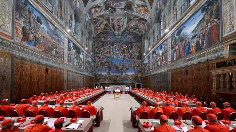 Cardinals pray in the Sistine Chapel, ahead of the conclave to elect the next pope at the Vatican, May 7, 2025. Vatican Media/Handout via REUTERS THIS IMAGE HAS BEEN SUPPLIED BY A THIRD PARTY
