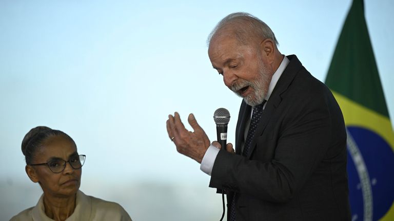 Brazilian President Luiz Inacio Lula da Silva talks with Environment Minister Marina Silva. Pic: AP